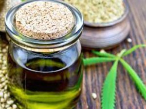 cbd-oil-with-hemp-seeds-and-leaf